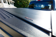 Load image into Gallery viewer, Roll-N-Lock 2019 Chevy Silverado 1500 68-3/8in E-Series Retractable Tonneau Cover