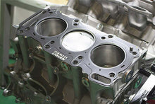 Load image into Gallery viewer, GReddy 09+ Nissan GTR R35 VR38DETT 0.8mm Thick 96mm Bore Metal Head Gaskets (Set of 2)