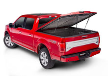 Load image into Gallery viewer, Undercover 22-26 Nissan Frontier 5ft Bed Elite Smooth Bed Cover