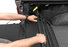 Load image into Gallery viewer, Roll-N-Lock 21-22 Ford F-150 (67.1in. Bed Length) Cargo Manager