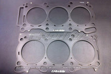 Load image into Gallery viewer, GReddy 09+ Nissan GTR R35 VR38DETT 0.8mm Thick 100mm Bore Metal Head Gaskets (Set of 2)