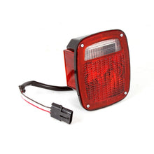 Load image into Gallery viewer, Omix Tail Light LH 98-06 Jeep Wrangler TJ