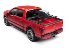 Load image into Gallery viewer, Roll-N-Lock 15-20 Ford F150 (w/o OE Cargo Tracks - 67.1in Bed) M-Series XT Retractable Tonneau Cover