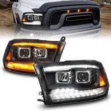 Load image into Gallery viewer, ANZO 09-18 Dodge Ram 1500/2500/3500 Proj HL Headlights Switchback + Sequential - Black Amber