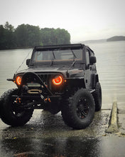 Load image into Gallery viewer, Oracle 7in High Powered LED Headlights - Black Bezel - Amber NO RETURNS