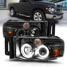 Load image into Gallery viewer, ANZO 2002-2005 Dodge Ram 1500 Projector Headlights w/ Halo Black Clear Amber