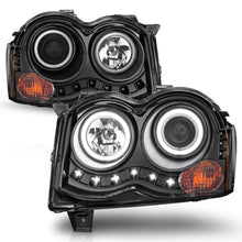 Load image into Gallery viewer, ANZO 2008-2010 Jeep Grand Cherokee Projector Headlights w/ Halo Black (CCFL)