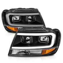 Load image into Gallery viewer, ANZO 99-04 Jeep Grand Cherokee Crystal Headlights - w/ Light Bar Black Housing