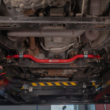 Load image into Gallery viewer, UMI Performance 15-20 Ford F-150 1 1/2in Solid Front Sway Bar - Red